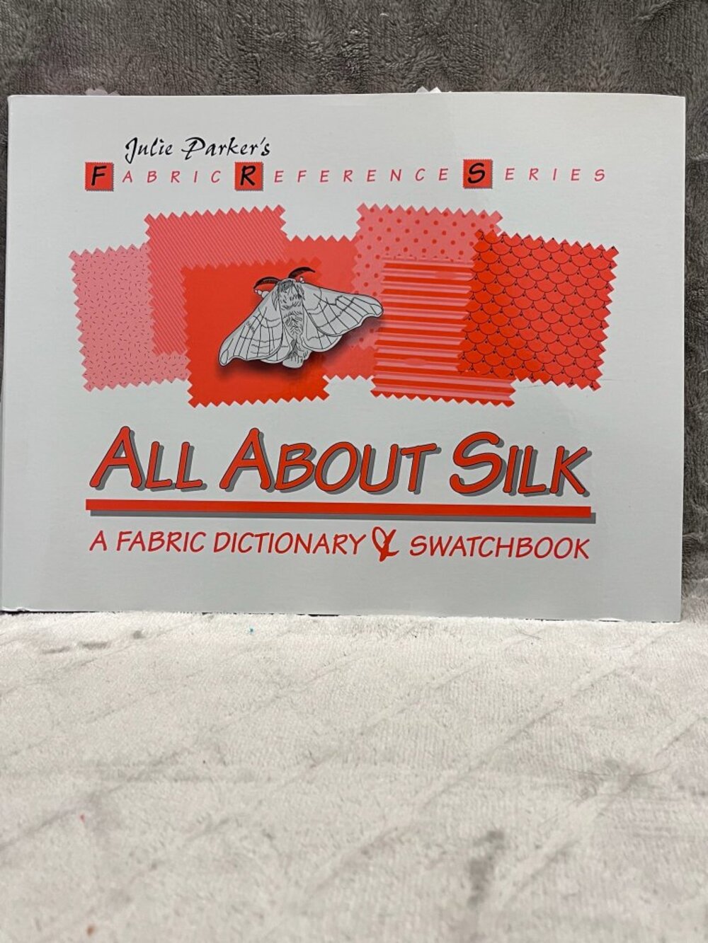 All About SILK: A Fabric Dictionary & Swatchbook - Julie Parker with Samples